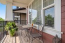 39 Heritage Boulevard, Cochrane, AB  - Outdoor With Deck Patio Veranda With Exterior 