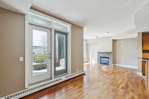 108-990 Centre Avenue Ne, Calgary, AB - Indoor With Fireplace