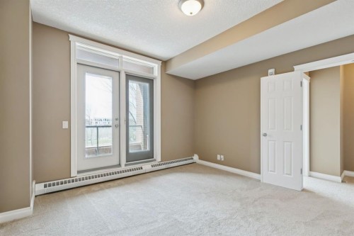 108-990 Centre Avenue Ne, Calgary, AB - Indoor Photo Showing Other Room