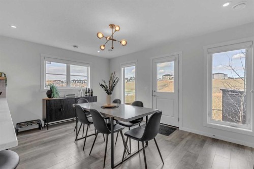 302-260 Rowley Way Nw, Calgary, AB - Indoor Photo Showing Dining Room
