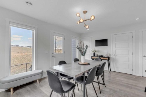 302-260 Rowley Way Nw, Calgary, AB - Indoor Photo Showing Dining Room