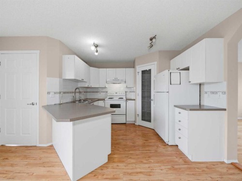 128 Taradale Drive Ne, Calgary, AB - Indoor Photo Showing Kitchen
