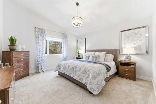 212 Cove Drive, Chestermere, AB - Indoor Photo Showing Bedroom