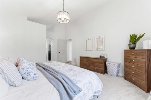 212 Cove Drive, Chestermere, AB - Indoor Photo Showing Bedroom