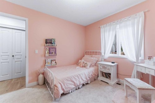 212 Cove Drive, Chestermere, AB - Indoor Photo Showing Bedroom