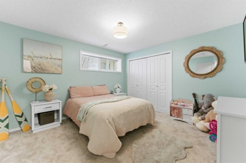 212 Cove Drive, Chestermere, AB - Indoor Photo Showing Bedroom