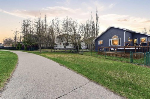 212 Cove Drive, Chestermere, AB - Outdoor With Deck Patio Veranda