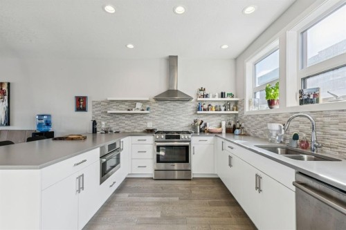 146 Norford Common Nw, Calgary, AB - Indoor Photo Showing Kitchen With Double Sink With Upgraded Kitchen