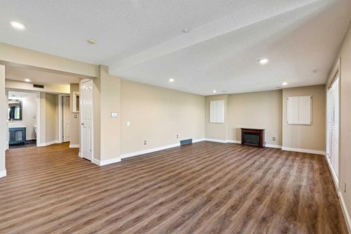 98 Sierra Nevada Green Sw, Calgary, AB - Indoor With Fireplace
