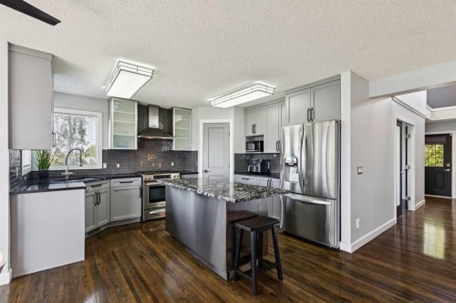 98 Sierra Nevada Green Sw, Calgary, AB - Indoor Photo Showing Kitchen With Stainless Steel Kitchen With Upgraded Kitchen