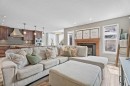 31 Brightondale Close Se, Calgary, AB  - Indoor Photo Showing Living Room With Fireplace 