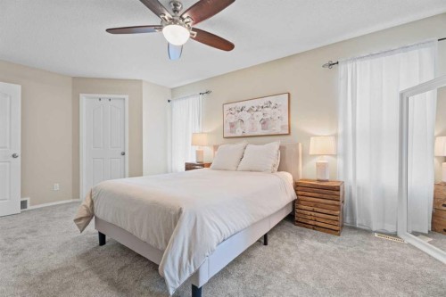 31 Brightondale Close Se, Calgary, AB - Indoor Photo Showing Bedroom