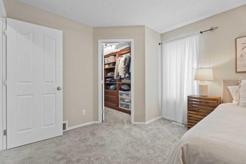 31 Brightondale Close Se, Calgary, AB - Indoor Photo Showing Bedroom