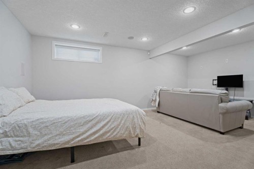 31 Brightondale Close Se, Calgary, AB - Indoor Photo Showing Bedroom