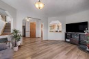450 Douglas Glen Boulevard Se, Calgary, AB  - Indoor Photo Showing Living Room 