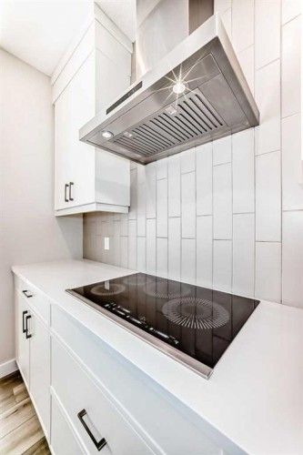 55 Silver Spruce Grove Sw, Calgary, AB - Indoor Photo Showing Kitchen