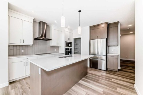 55 Silver Spruce Grove Sw, Calgary, AB - Indoor Photo Showing Kitchen With Double Sink With Upgraded Kitchen