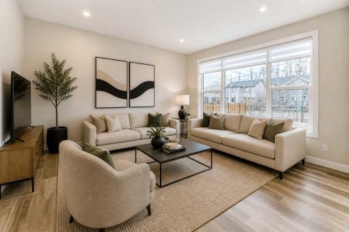 55 Silver Spruce Grove Sw, Calgary, AB - Indoor Photo Showing Living Room