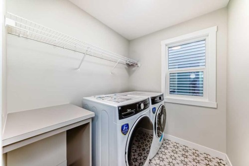 55 Silver Spruce Grove Sw, Calgary, AB - Indoor Photo Showing Laundry Room