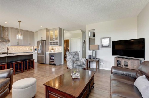 143 Cougarstone Court Sw, Calgary, AB - Indoor Photo Showing Living Room