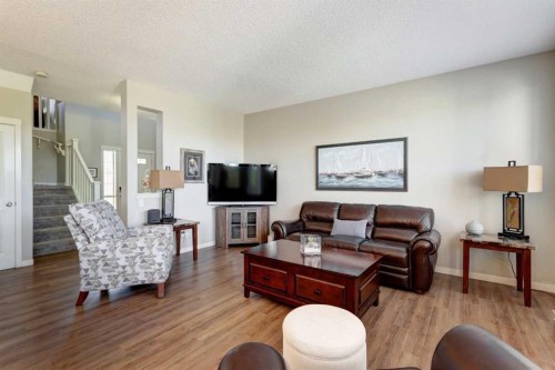 143 Cougarstone Court Sw, Calgary, AB - Indoor Photo Showing Living Room