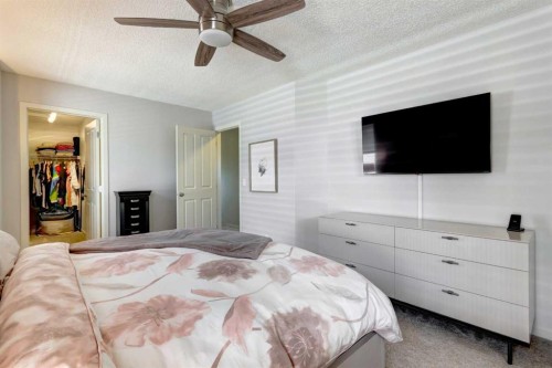 143 Cougarstone Court Sw, Calgary, AB - Indoor Photo Showing Bedroom