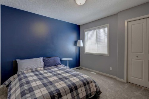 143 Cougarstone Court Sw, Calgary, AB - Indoor Photo Showing Bedroom