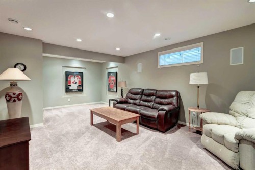 143 Cougarstone Court Sw, Calgary, AB - Indoor Photo Showing Basement