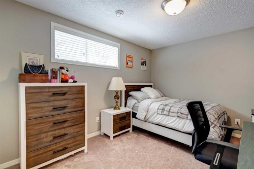 143 Cougarstone Court Sw, Calgary, AB - Indoor Photo Showing Bedroom