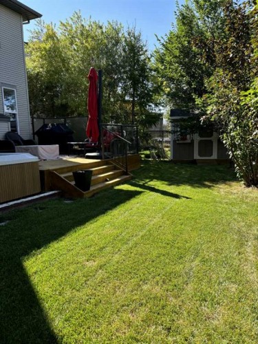 143 Cougarstone Court Sw, Calgary, AB - Outdoor