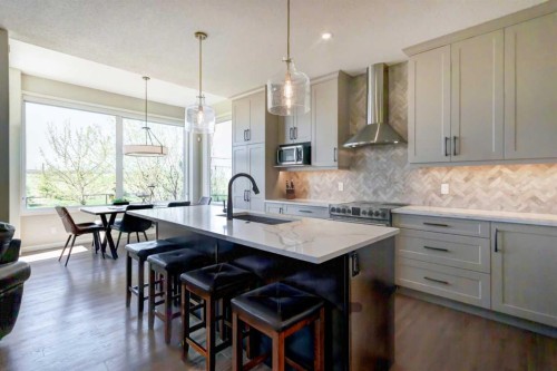 143 Cougarstone Court Sw, Calgary, AB - Indoor Photo Showing Kitchen With Upgraded Kitchen