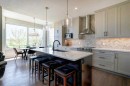 143 Cougarstone Court Sw, Calgary, AB  - Indoor Photo Showing Kitchen With Upgraded Kitchen 