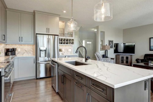 143 Cougarstone Court Sw, Calgary, AB - Indoor Photo Showing Kitchen With Upgraded Kitchen