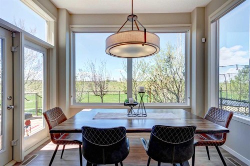143 Cougarstone Court Sw, Calgary, AB - Indoor Photo Showing Dining Room