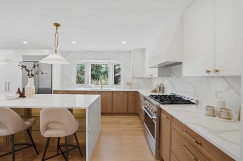 119 Canterville Road Sw, Calgary, AB - Indoor Photo Showing Kitchen With Upgraded Kitchen