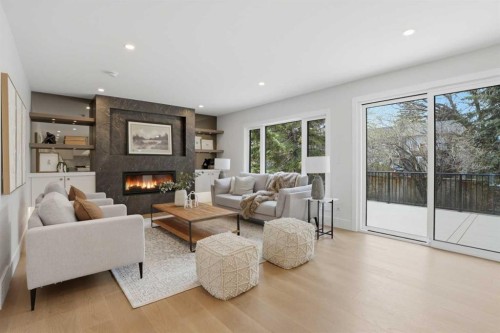 119 Canterville Road Sw, Calgary, AB - Indoor Photo Showing Living Room With Fireplace