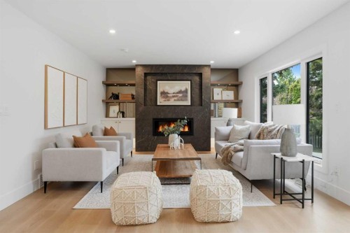 119 Canterville Road Sw, Calgary, AB - Indoor Photo Showing Living Room With Fireplace