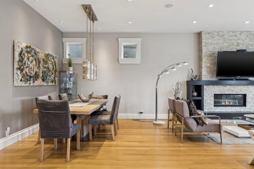 1624 Broadview Road Nw, Calgary, AB - Indoor Photo Showing Dining Room With Fireplace