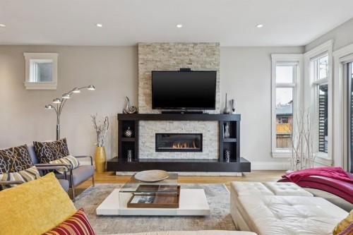 1624 Broadview Road Nw, Calgary, AB - Indoor Photo Showing Living Room With Fireplace