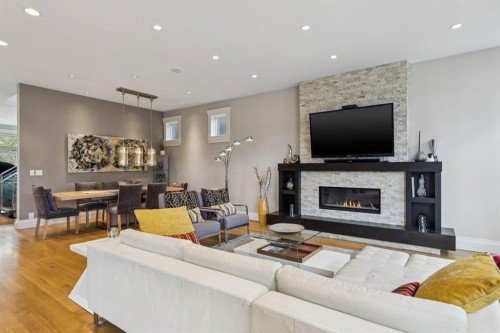 1624 Broadview Road Nw, Calgary, AB - Indoor Photo Showing Living Room With Fireplace