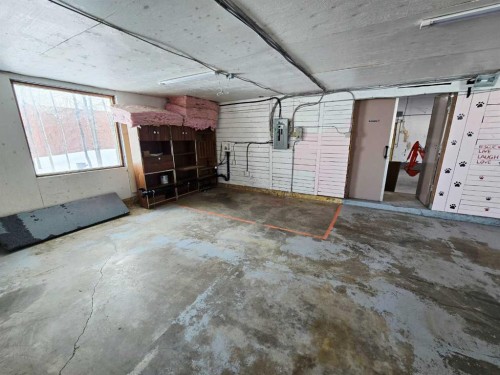 272128 Range Road 291 Ne, Airdrie, AB - Indoor Photo Showing Garage