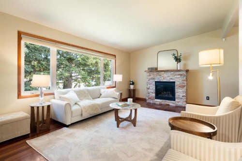 1619 47 Street Sw, Calgary, AB - Indoor Photo Showing Living Room With Fireplace