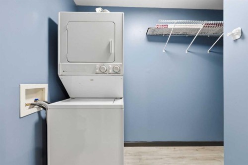 203-3103 Blakiston Drive Nw, Calgary, AB - Indoor Photo Showing Laundry Room