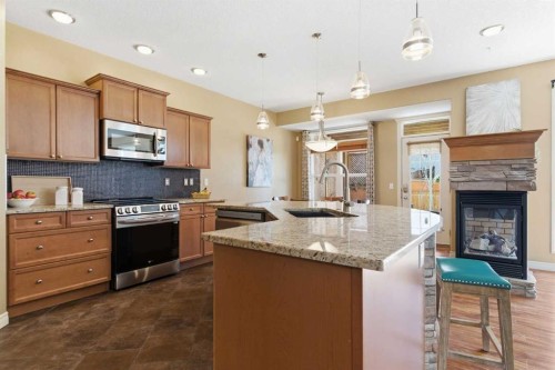 78 Westmount Circle, Okotoks, AB - Indoor Photo Showing Kitchen With Stainless Steel Kitchen With Upgraded Kitchen