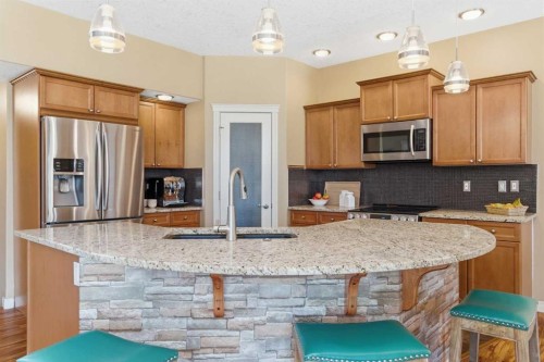78 Westmount Circle, Okotoks, AB - Indoor Photo Showing Kitchen With Stainless Steel Kitchen