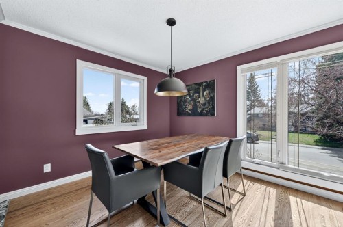 8 Slocan Road Sw, Calgary, AB - Indoor Photo Showing Dining Room