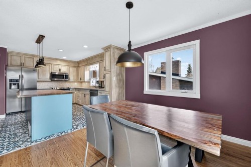 8 Slocan Road Sw, Calgary, AB - Indoor Photo Showing Kitchen With Stainless Steel Kitchen With Upgraded Kitchen
