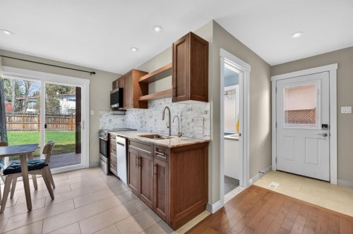 8 Slocan Road Sw, Calgary, AB - Indoor Photo Showing Kitchen