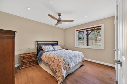 8 Slocan Road Sw, Calgary, AB - Indoor Photo Showing Bedroom