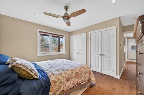 8 Slocan Road Sw, Calgary, AB - Indoor Photo Showing Bedroom